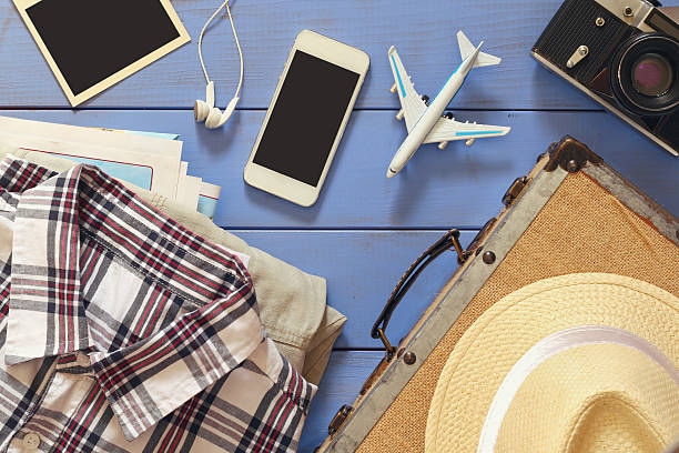 istock traveling concept with clothes ready to be packed. top view 531927930
