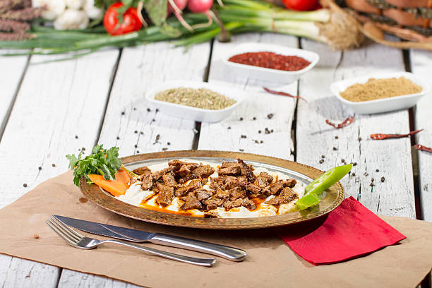 istock Turkish Ali Nazik Kebab , lamb with aubergine yogurt paste 531929690