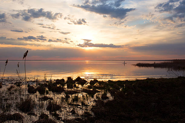 istock Colorful sunset on the water 531930088