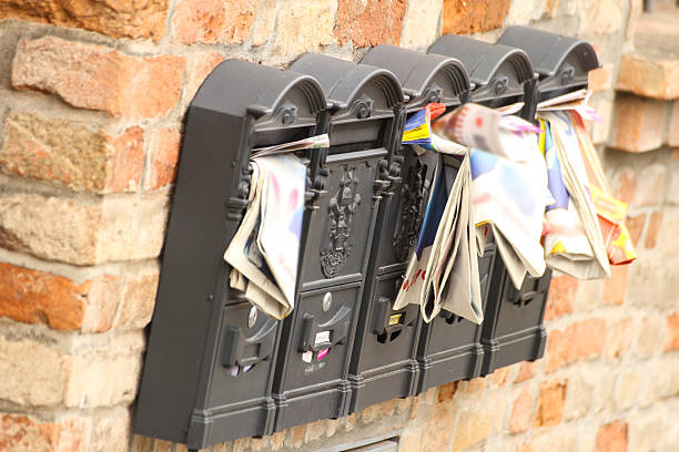 istock Mailboxes full of advertising magazines 531930094