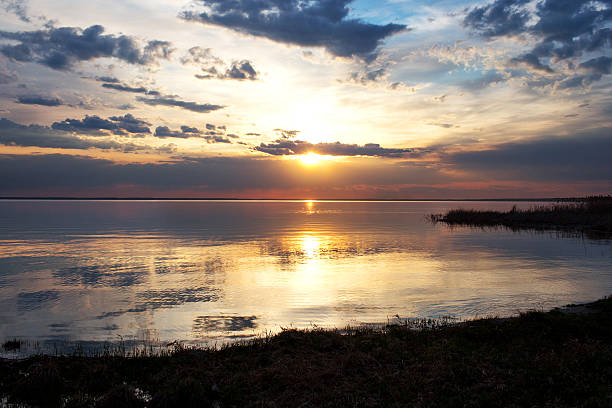 istock Colorful sunset on the water 531930304