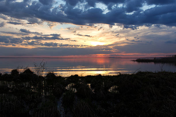 istock Colorful sunset on the water 531930522