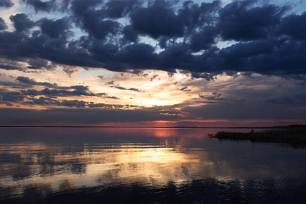 istock Colorful sunset on the water 531930658