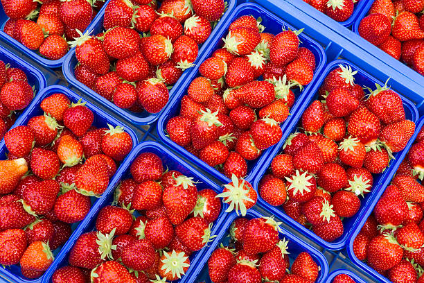 istock Ripe strawberries on a market 531932738