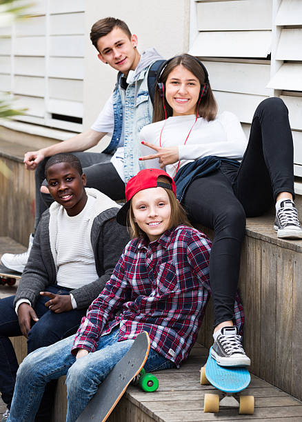 istock teens spending time together in sunny day 531933952
