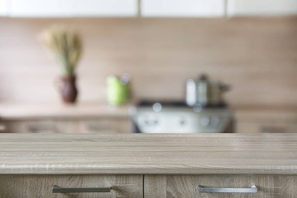 istock Blurred background. Modern kitchen with tabletop and space for you. 531935032