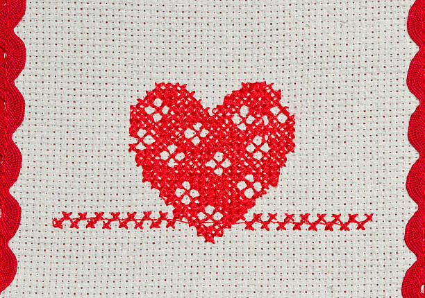 istock red heart embroidered in cross stitch on canvas 531935672