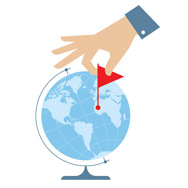 Flat illustration of western globe and hand with flag marker Business trip concept. Flat vector illustration of western globe hemisphere and human hand with flag marker. Man is pinning a place on the map. Infographic element for web, publish, social networks. finger spinning globe stock illustrations