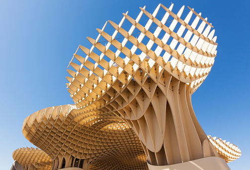 Seville, Spain - May 1, 2016: The Metropol Parasol by architect Jurgen Mayer at Plaza de la Encarnacion in Seville, designed by Juergen Mayer H. it is the largest wooden structure in the world.