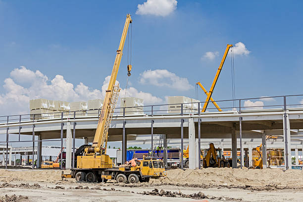 istock Mobile crane is raising package of glass wool. 531940008