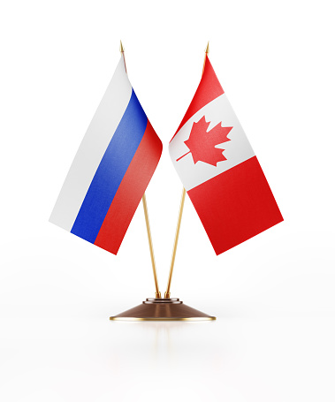 Miniature Flag of Russia and Canada. Isolated on white background. Clipping path is included.