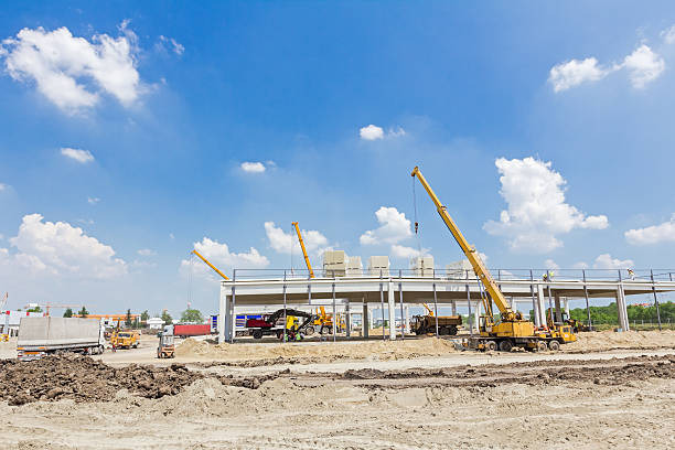 istock Mobile crane is raising package of glass wool. 531941922