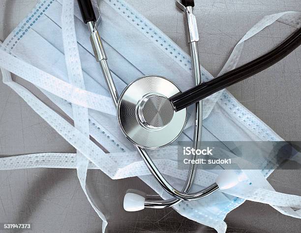 Surgical Mask And A Stethoscope The Symbols Of Medicine Stock Photo - Download Image Now