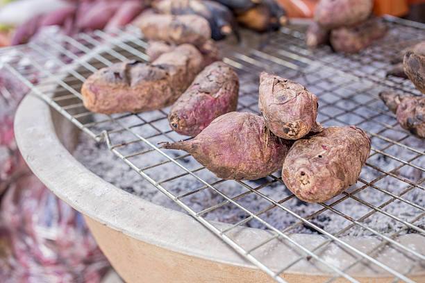 grilled sweet potato on sieve stock photo