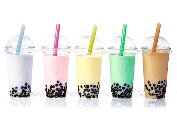 Bubble Tea in a row Various Bubble Tea in a row isolated on white background. bubble tea photos stock pictures, royalty-free photos & images