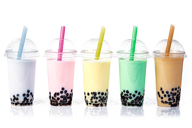 Bubble Tea in a row Various Bubble Tea in a row isolated on white background. strawberry crush stock pictures, royalty-free photos & images