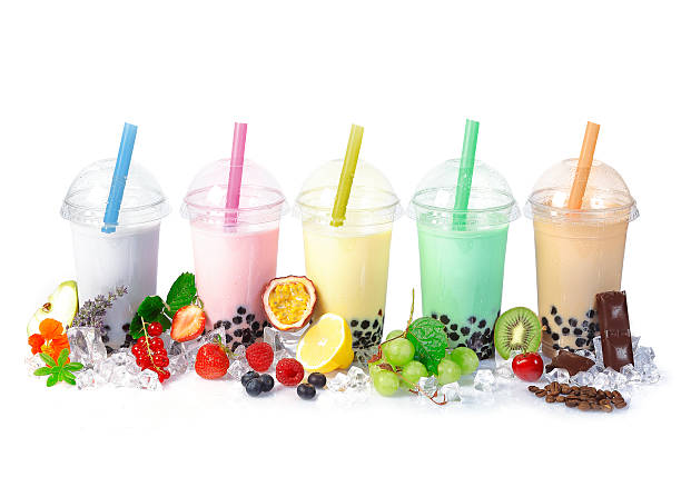 Bubble Tea in a row Various Bubble Tea in a row isolated on white background with different fruits. bubble tea photos stock pictures, royalty-free photos & images
