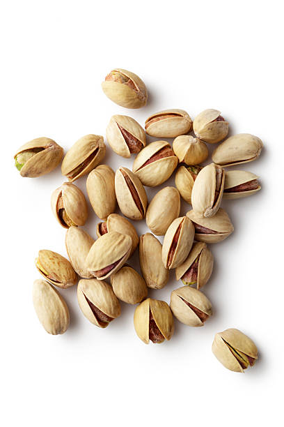 Nuts: Pistachios More Photos like this here... Pistachio stock pictures, royalty-free photos & images