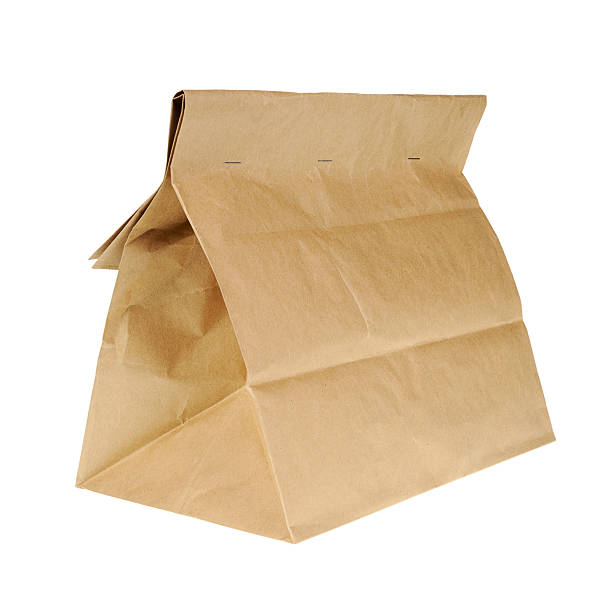 istock Lunch brown recycle paper bag isolated on white background. 531948899