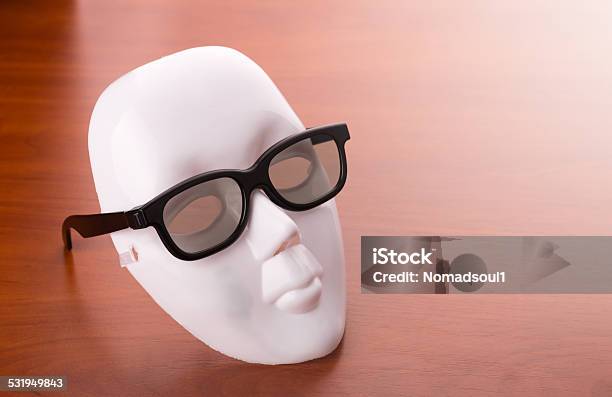 Theater Mask In Glasses On The Table Stock Photo - Download Image Now - 2015, Actor, Anthropomorphic Face