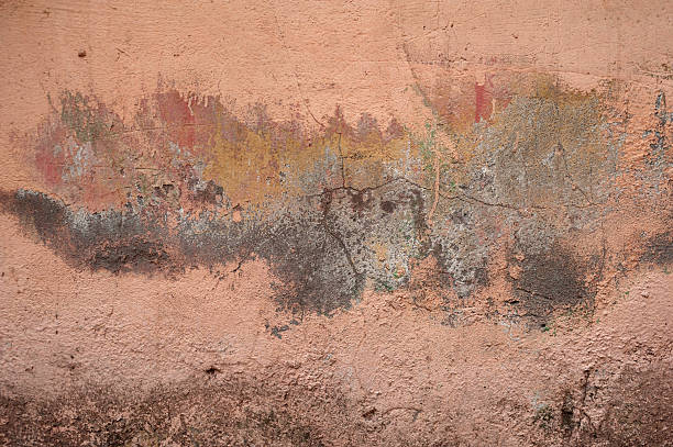 istock Texture of old wall covered with pink stucco 531949905