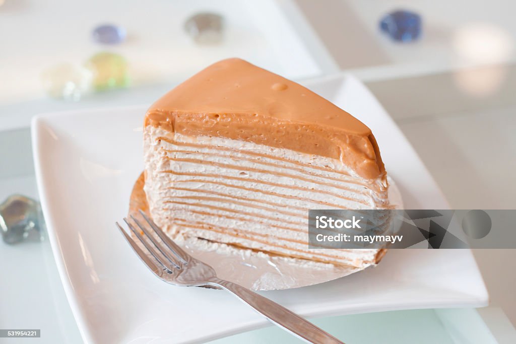 Thai tea crepe cake thai tea crepe cake on white plate 2015 Stock Photo
