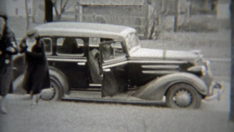 1938: Fashionable women arrive by car to the private party.