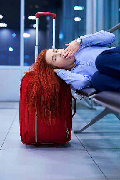 istock yawning and waiting inside airport lounge 531965486