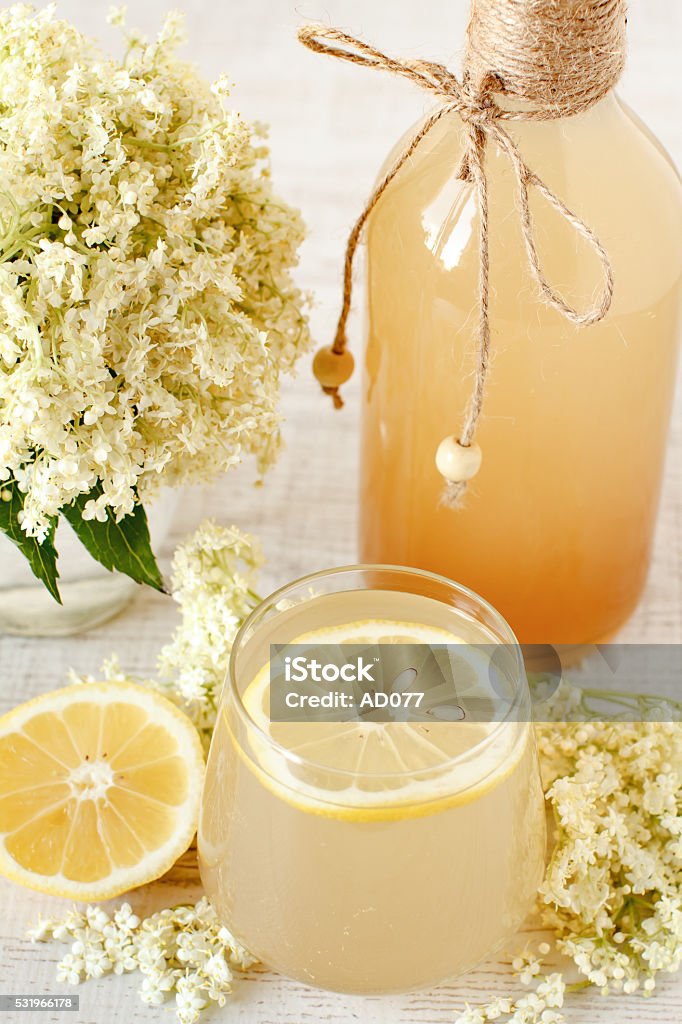 Elderberry flower drink with sliced lemon Elderberry flower drink with sliced lemon, close up Alternative Medicine Stock Photo