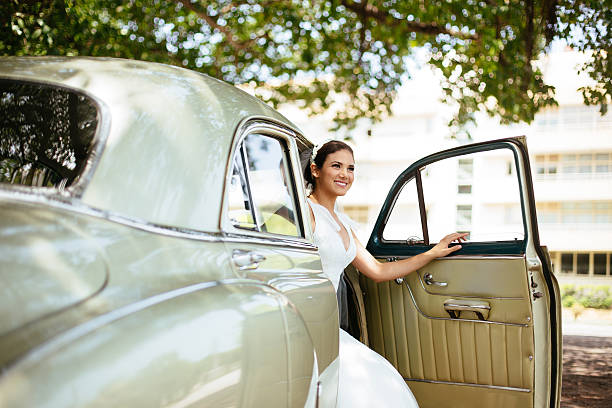 istock Beautiful Hispanic bride looking out of the car 531966270