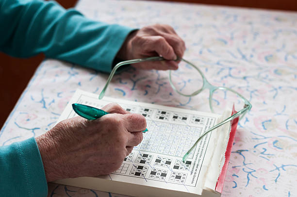 istock Senior women solve crosswords 531967374