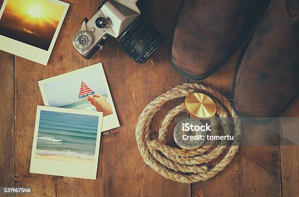 Compass Rope Hiking Boots And Old Camera Stock Photo - Download Image Now - Group Of Objects, Horizontal, No People