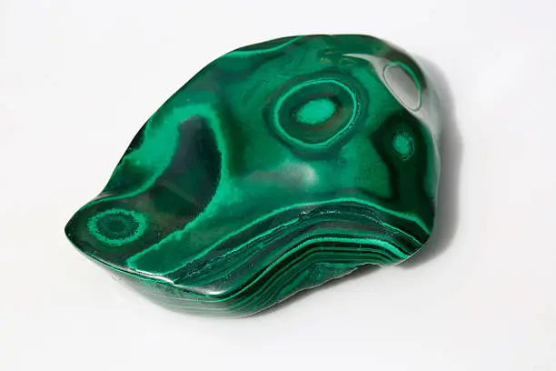 polished malachite isolated on white