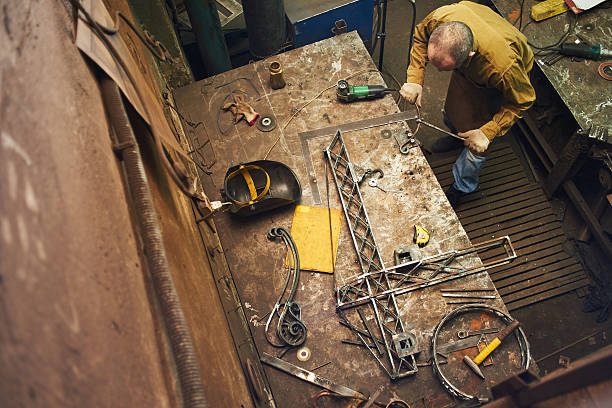 istock Master manufactures metal products handmade 531968746