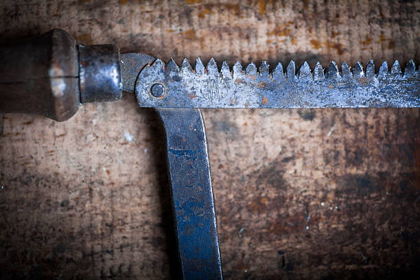 istock Hacksaw on wooden plank 531970000