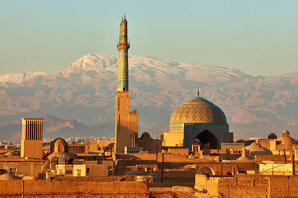 Photo of Ancient city of Yazd in sunrise lights. Iran