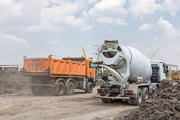 istock Big hydraulic dump truck is moving on building site 531973048