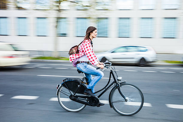 istock Woman riding bicycle in Berlin 531975448