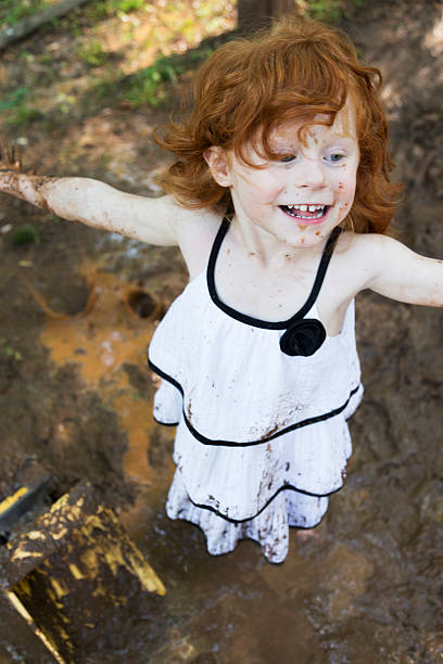 istock Little Girls Play in the Mud 531977588