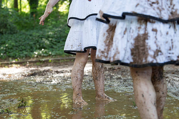istock Little Girls Play in the Mud 531977806