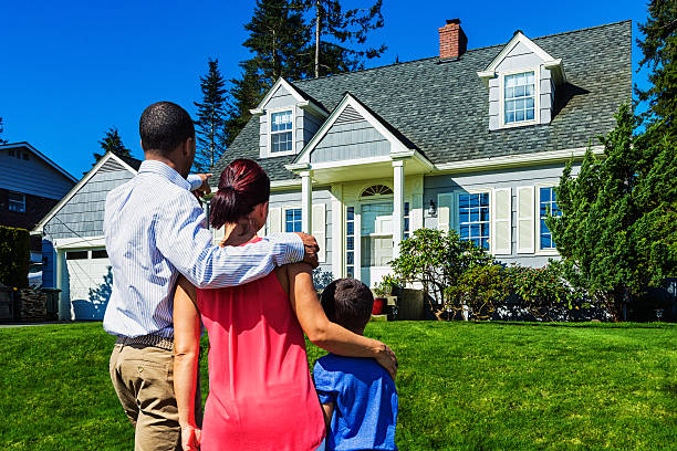 istock Happy Young Family Admiring Home 531978008