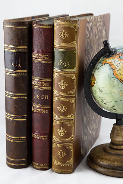 istock Three Leather Bound Antiquarian Books with Grey Background 531978560