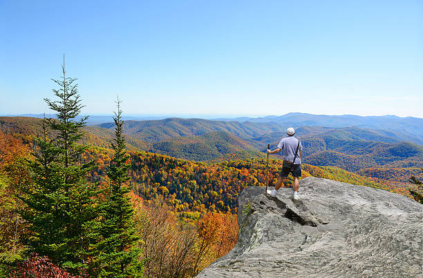 istock Man hiking in autumn mountains. 531978678