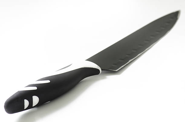 istock Black knife with hard plastic arm isolated on white 531980576