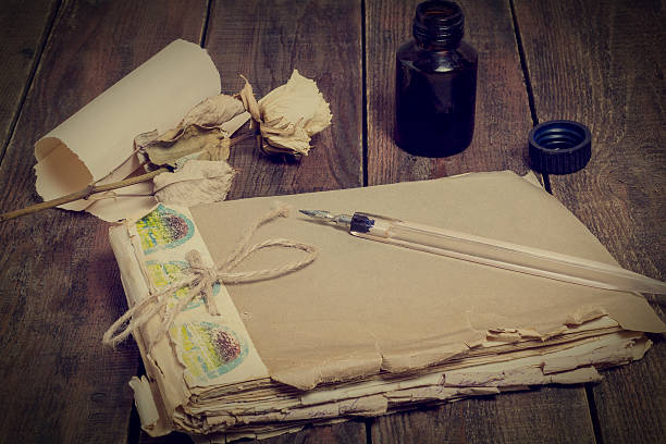 istock The composition in retro style: old notebook, pen and ink 531981458