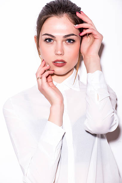 istock Beautiful young woman posing and looking at camera 531981752