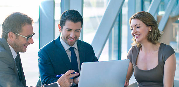 Interview Three business people finishing the interview in the office. stars in your eyes stock pictures, royalty-free photos & images