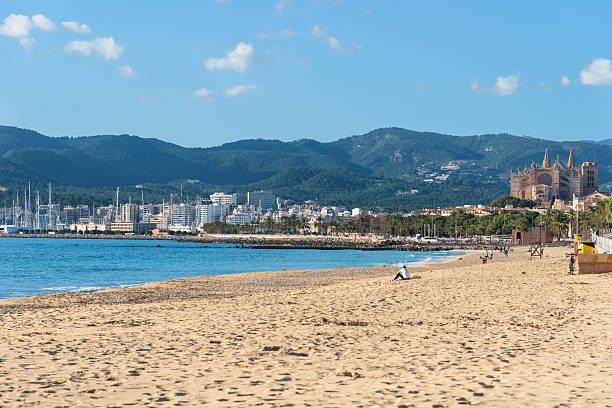 beach in Palma de Mallorca, Spain - with the cathedral in the background. Photo taken in winter without tourists