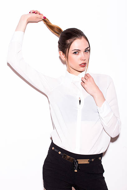 istock Beautiful young woman posing and looking at camera 531985950