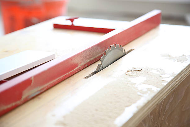 istock cutting wood on electric saw 531986272